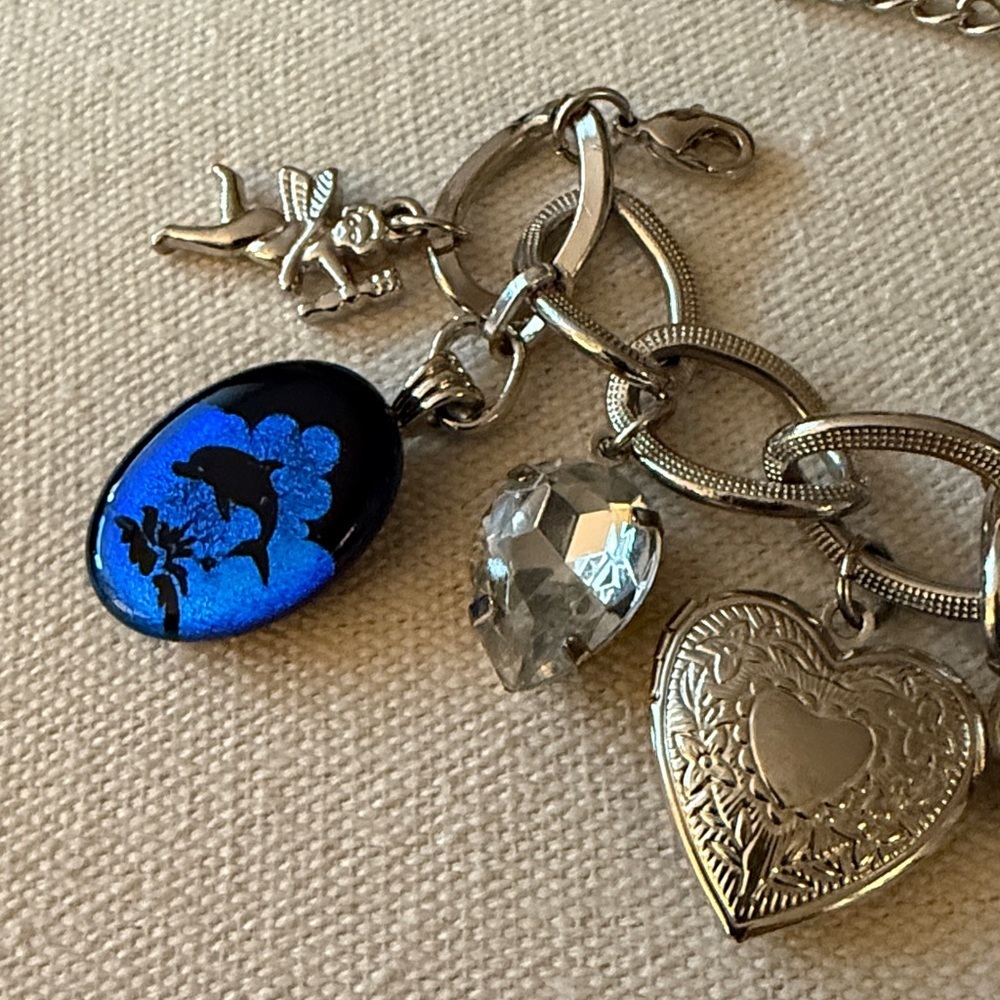 Silver-tone Adjustable Charm Bracelet with 12 charms. - Picture 2 of 8